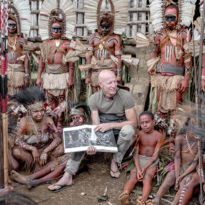 Jimmy Nelson Showing His Book